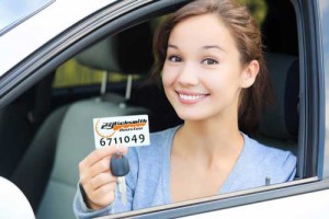 Happy-girl-in-a-car-key